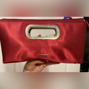 XOXO red clutch purse, zipper closure and buckle handle new with tags
